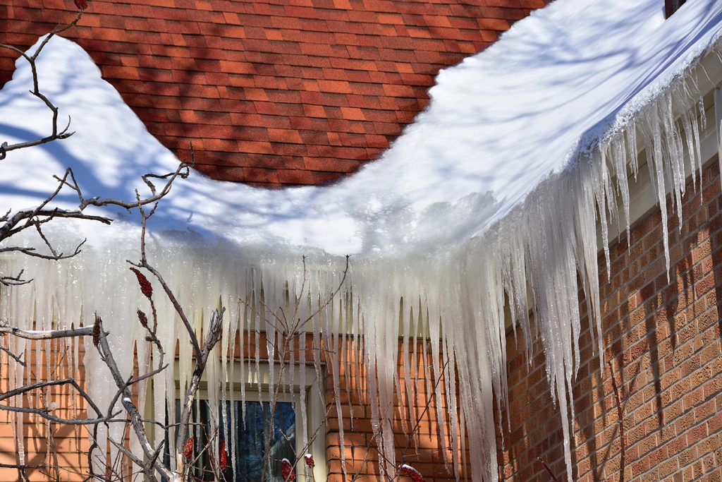 Ice dams due to clogged gutters