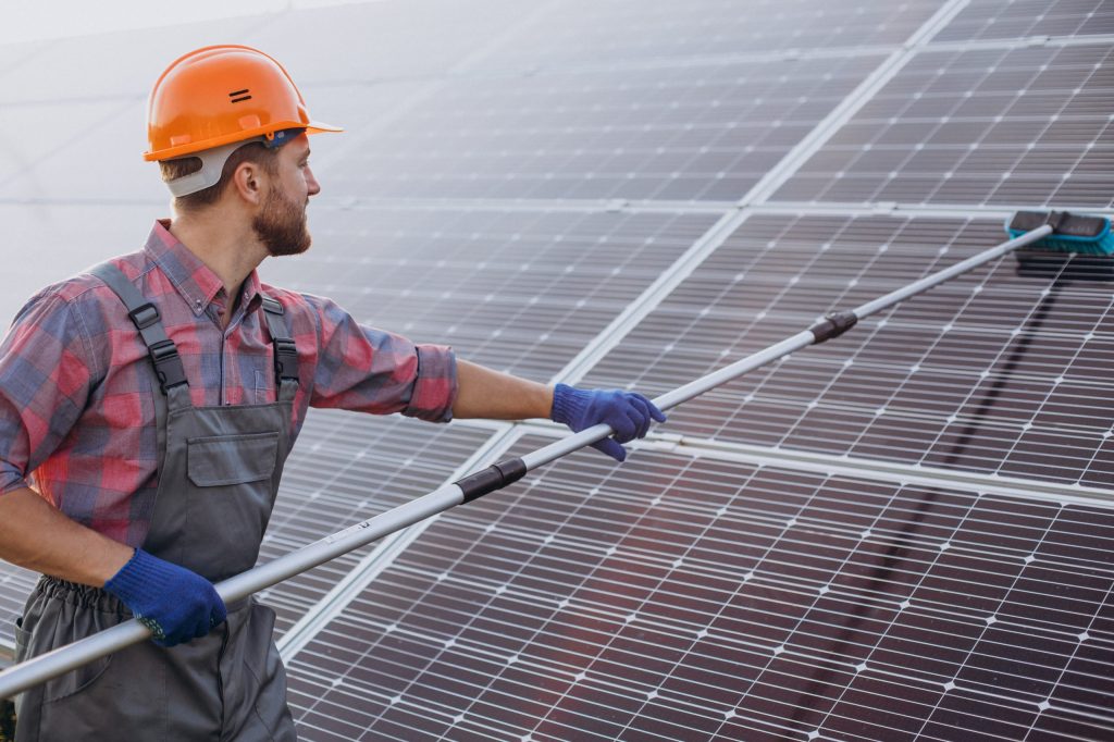 solar panels being cleaned