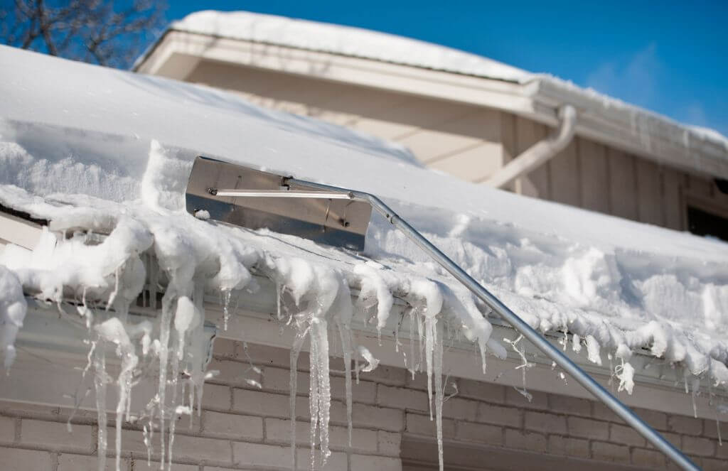 removing snow from roof