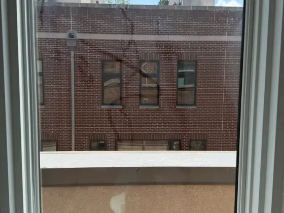 Window in Chicago, IL before inside & outside window cleaning