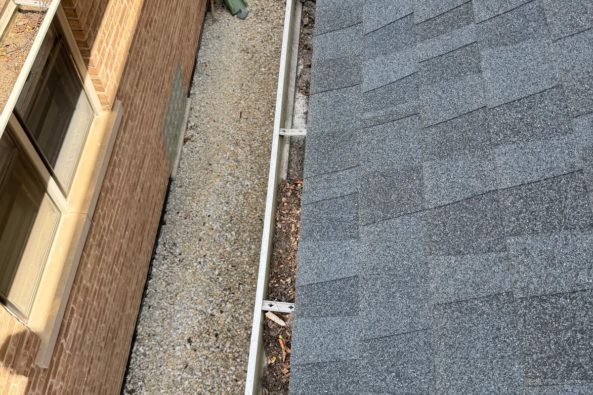 Gutter Cleaning before — Chicago IL 2-story house
