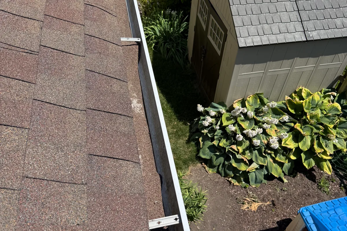 Gutter Cleaning before — Grayslake IL 2-story house