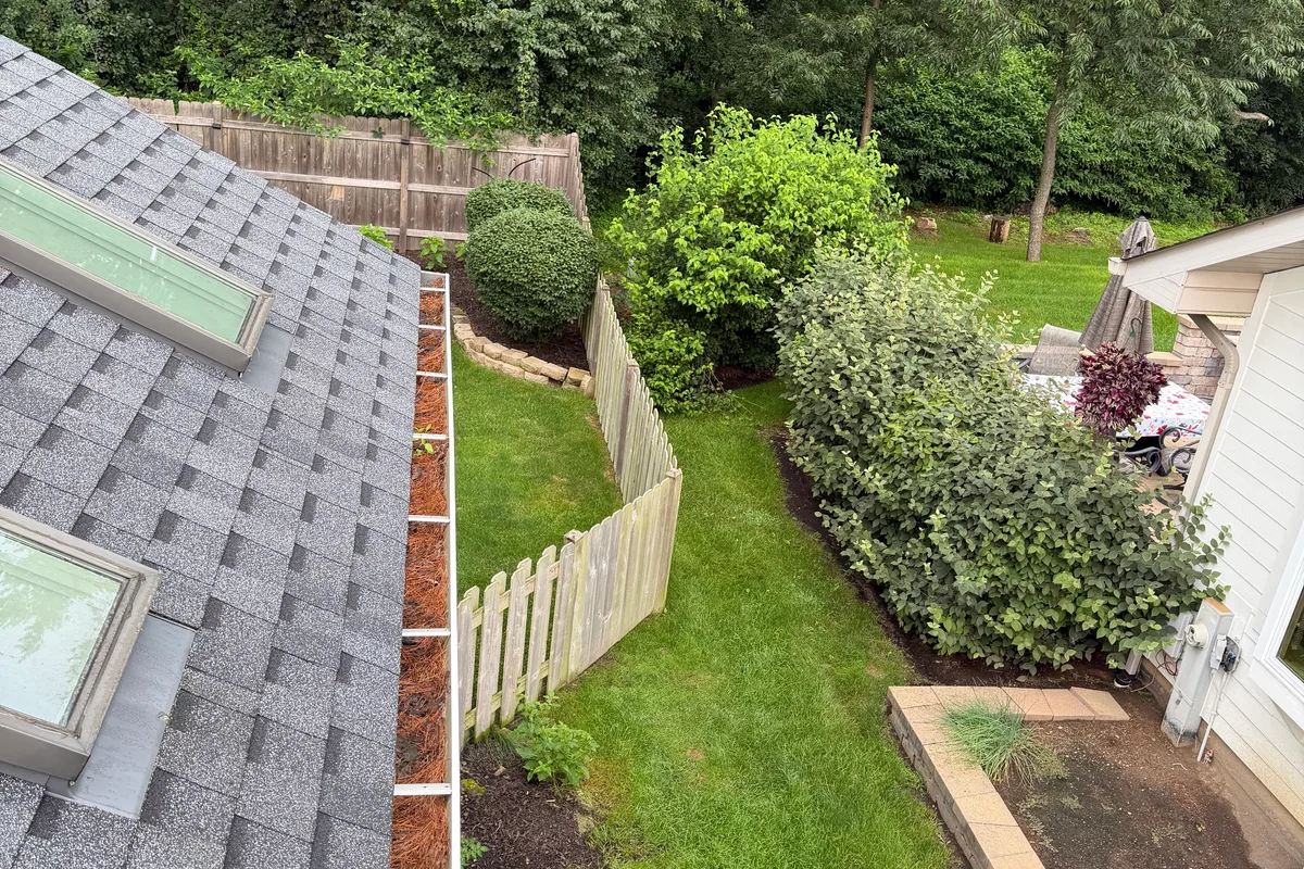 Gutter Cleaning before — Lake Villa IL 1-story house