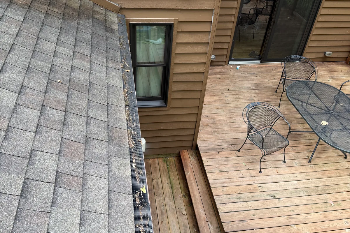 Gutter Cleaning before — Roselle IL 2-story house