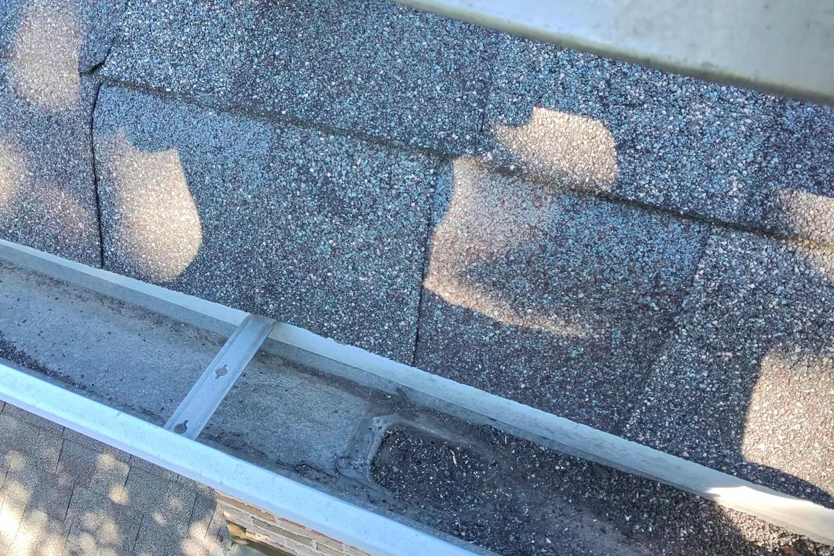 Gutter Cleaning before — Western Springs IL 3-story house