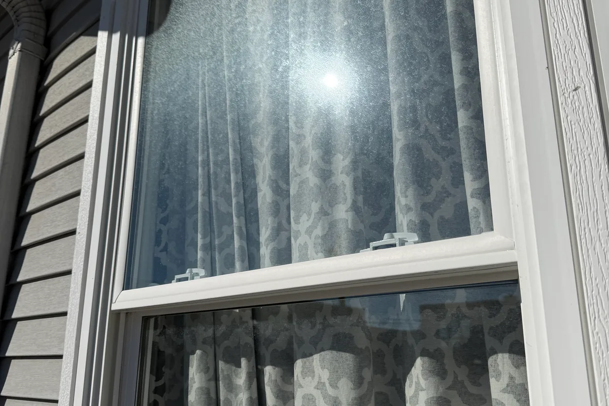 Window Washing before — Chicago IL 1-story house
