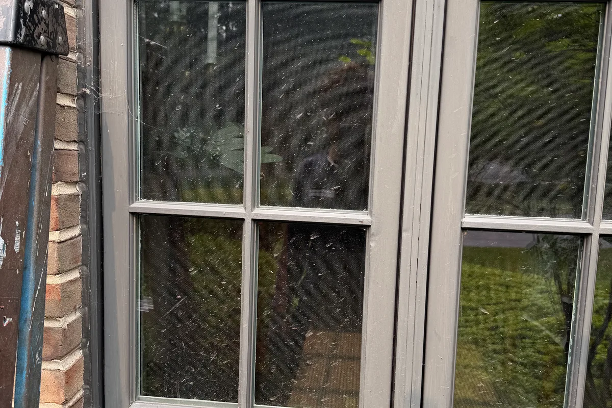 Window Washing before — Lake Forest IL 2-story house