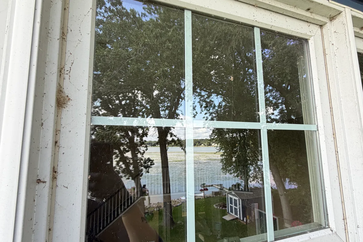 Window Washing before — McHenry IL 2-story house